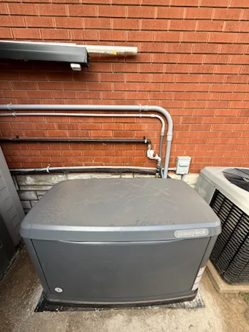Generator unit installed beside house