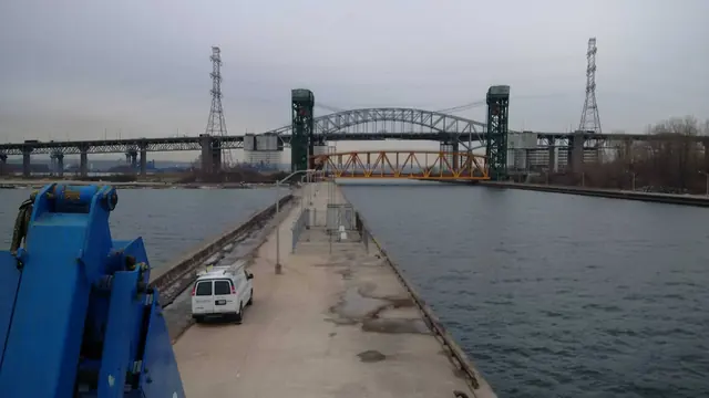 View of the Burlington Canal Lift Bridge from the pier during a commercial lighting upgrade and retrofit project beside the waterway.