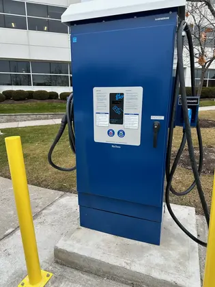 Commercial EV charger unit installed outdoors in Hamilton