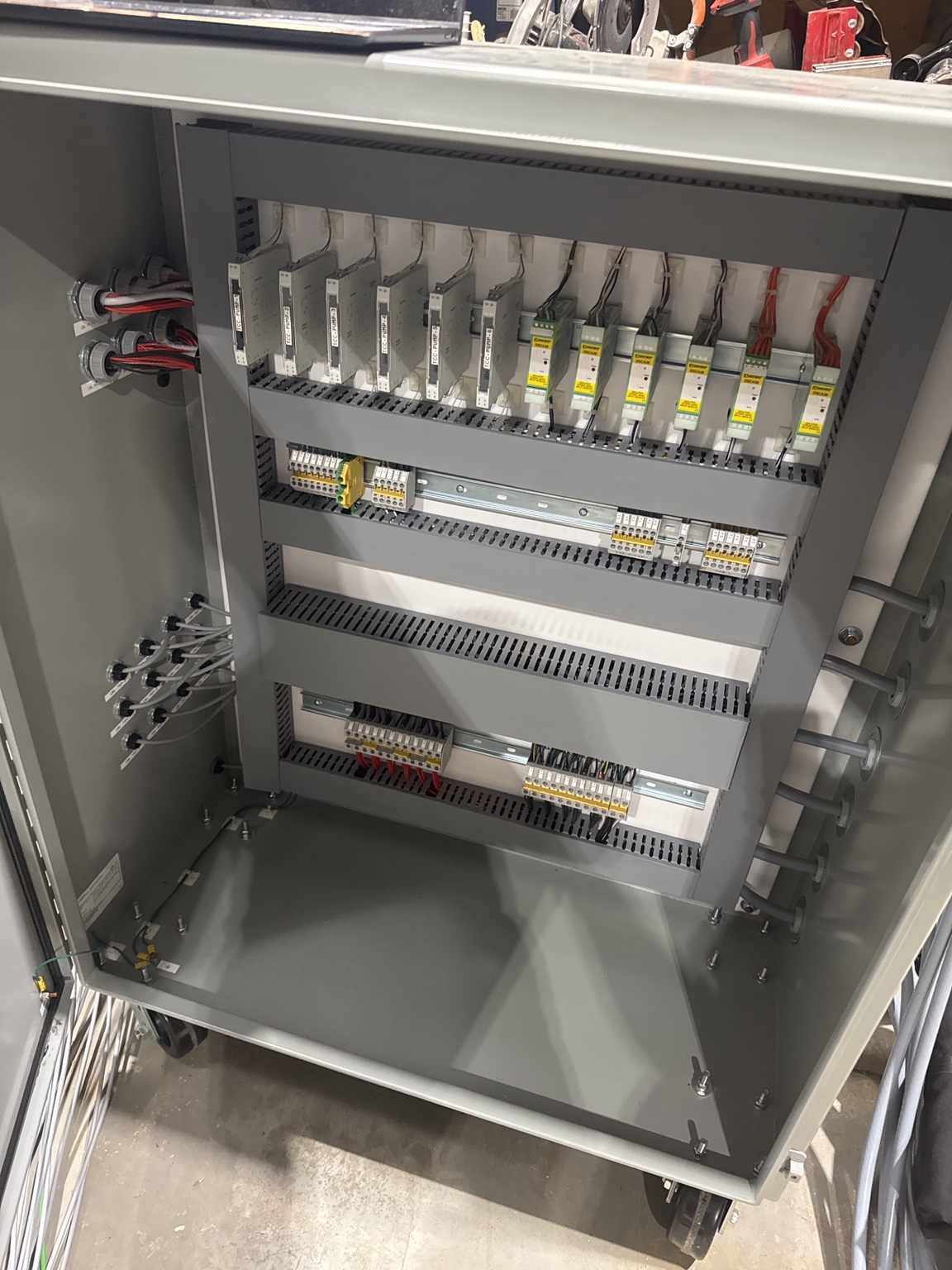 Custom industrial control cabinet for a PLC-controlled pump test system